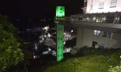 Durante este mês de junho, o Elevador Lacerda, o Farol da Barra e os viadutos do BRT vão receber iluminação especial para chamar