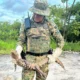 como Povoado Fazenda Velha. Ao chegarem, os militares constataram a presença de um jacaré-anão, espécie nativa de ambientes alagados
